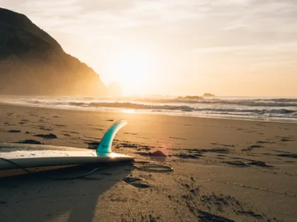 A Surfboard on the Sand