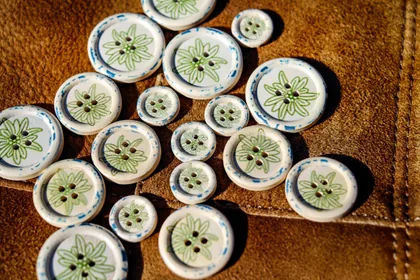 Flowered Buttons on Suede
