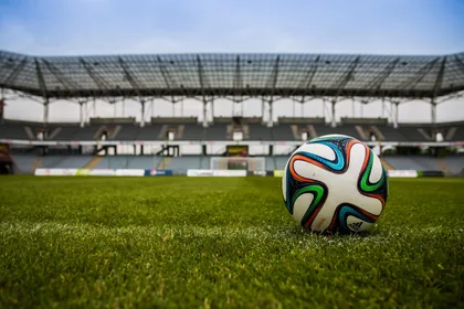 A Football on the Empty Pitch