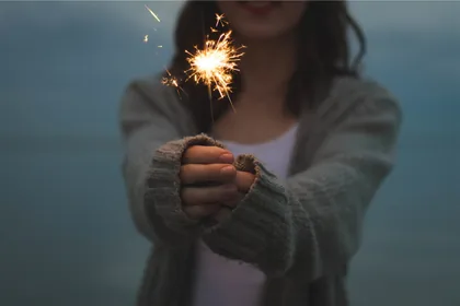 Holding a Lit Sparkler