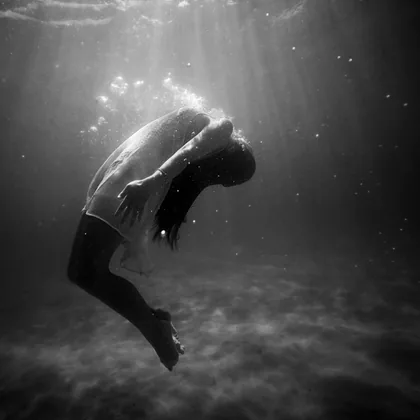Woman Drifting Underwater