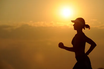 Runner Silhouetted Against the Sun
