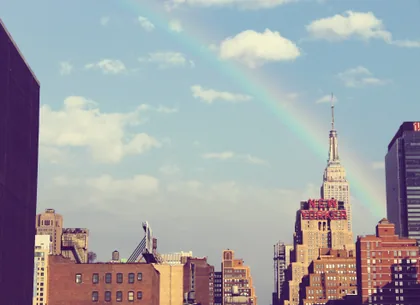 Rainbow Over the City Skyline