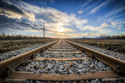 Railway Tracks Towards the Low Sun