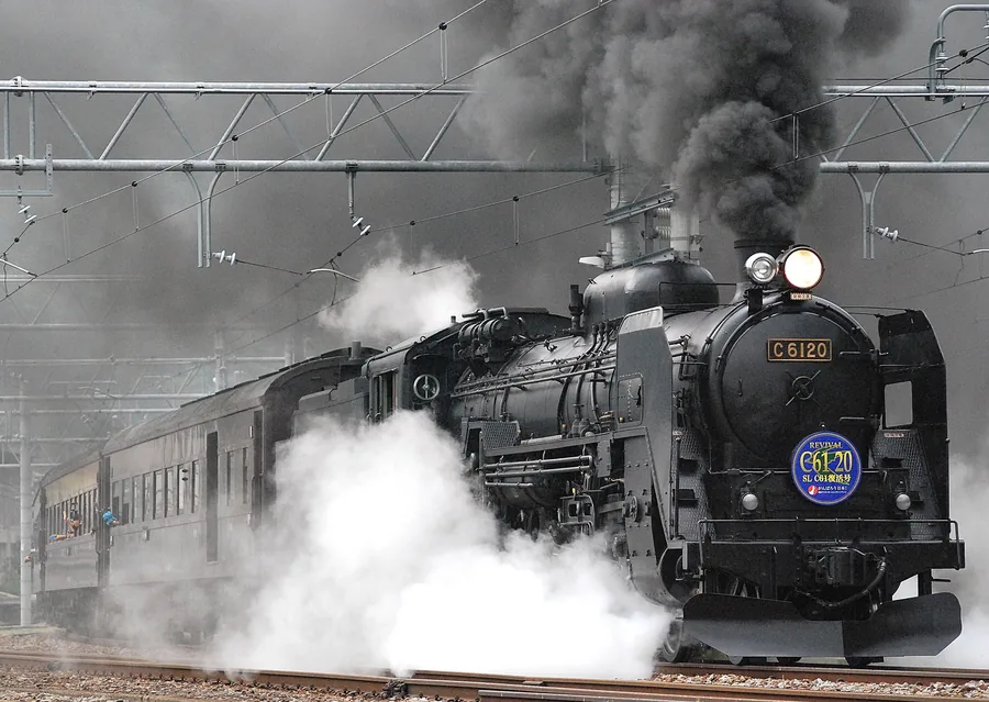 A Steam Locomotive Under Billowing Smoke