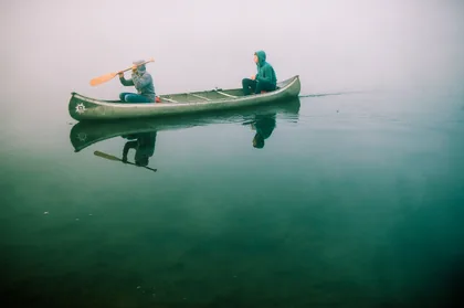 Canoeing on Misty Still Water