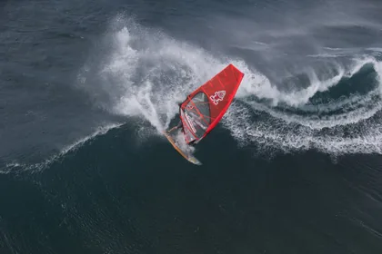 Windsurfer Carving a Wave