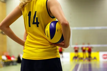 Volleyball Player Holding the Ball