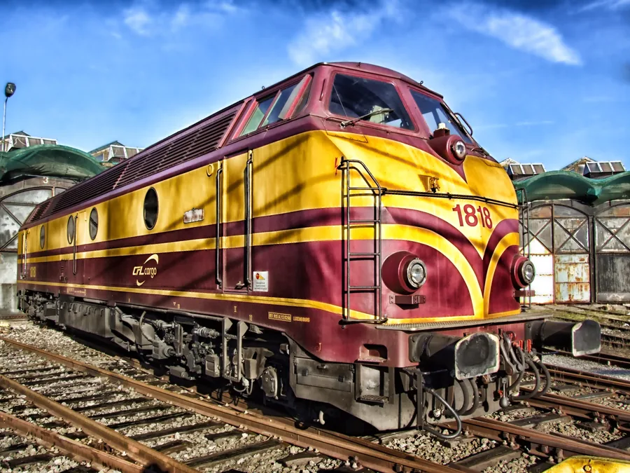 A Maroon and Yellow Diesel Locomotive