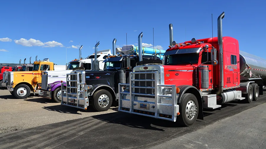 A Line of Parked Semi Trucks