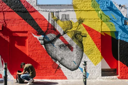 Heart Mural on a Painted Brick Wall