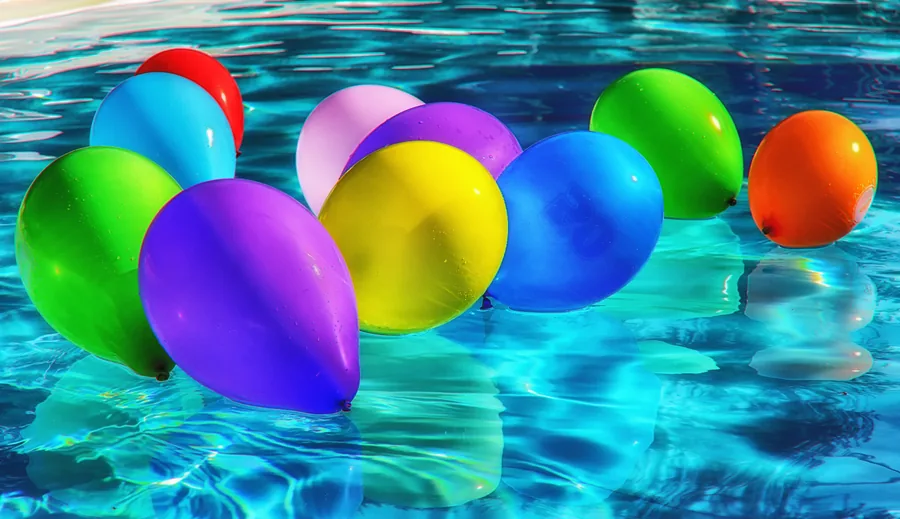Balloons Floating in a Pool