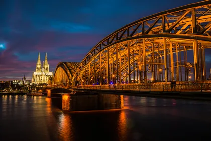 Lit Steel Bridge at Dusk