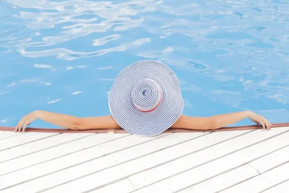 Striped Sun Hat at the Pool Edge