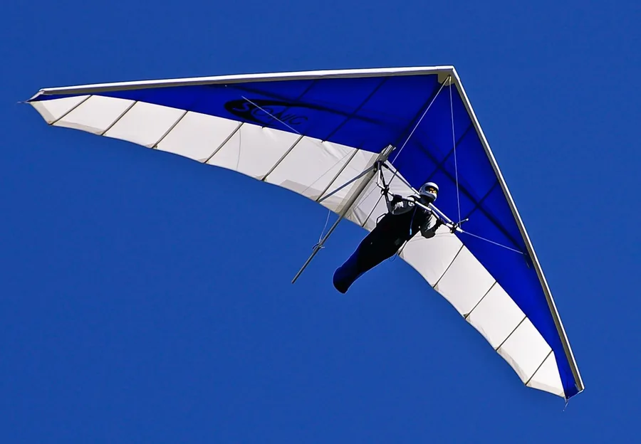 Hang Glider Against a Deep Blue Sky